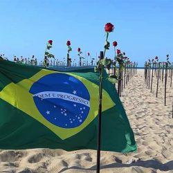 Rosas na praia, sinos tocando: o país em luto pelas 500 mil mortes. Presidente ignora